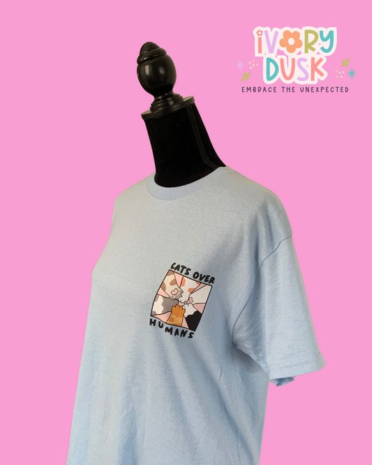 Cats over humans tee by Ivory Dusk