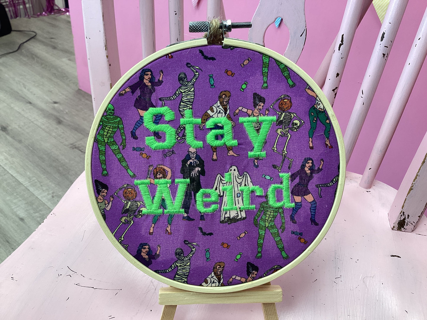 Stay weird (green lettering) by Toria Creates