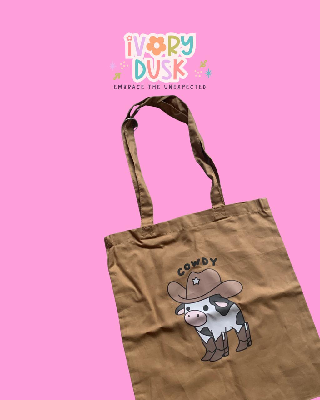 Cowdy tote bag by Ivory Dusk