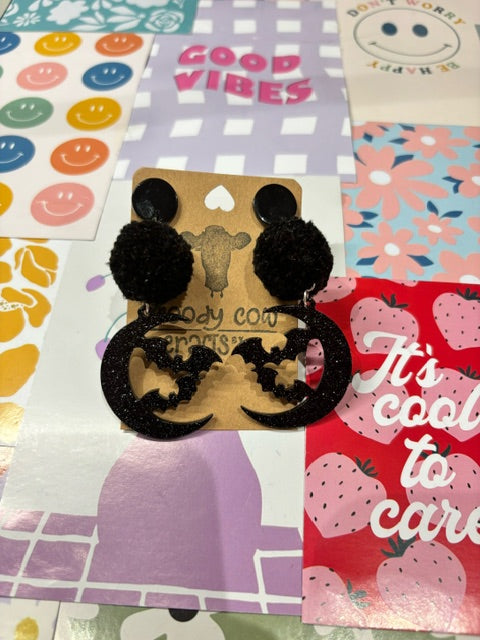 Black Halloween Pom earrings by Moody Cow